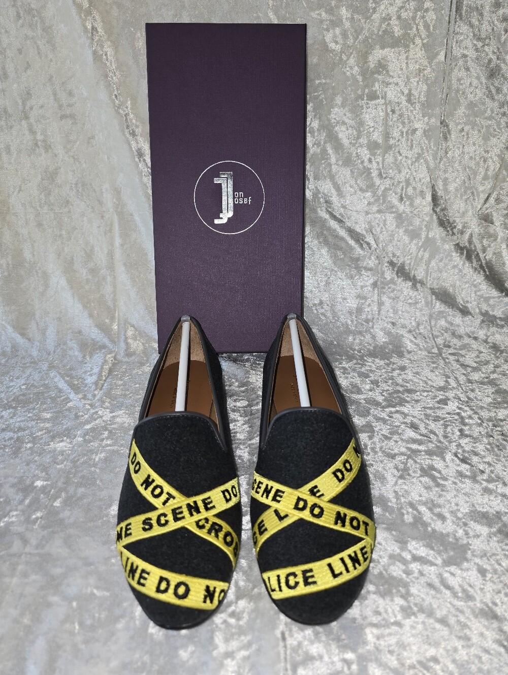 Jon Josef Black Women's Slip-On Loafers with Yellow 'Do Not Cross' Tape
